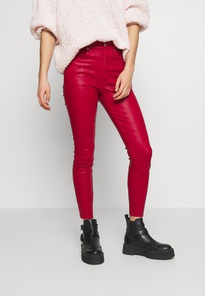 Vaqueros pitillo - coloured denim