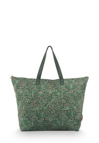 Groene tas met bloemenpatroon, gemaakt van geborduurd stof. Voorzien van twee groene leren handvatten en een ritssluiting.
