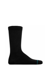Svart räfflad strumpa med en enhetlig design. Har en kontrasterande turkos detalj i tåområdet. Tillverkad av ett mjukt, stretchigt material.