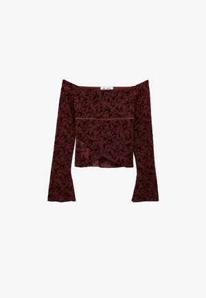 Top borgogna a spalle scoperte con maniche lunghe a campana, caratterizzato da un motivo floreale nero e un tessuto morbido e texture.