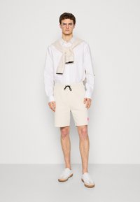 HUGO DIZ - Pantaloni de trening - open white