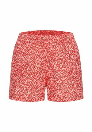 Red shorts with a white floral pattern, featuring an elastic waistband and a straight cut. Made from lightweight fabric.