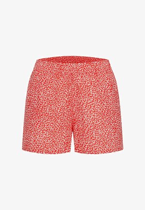 Red shorts with a white floral pattern, featuring an elastic waistband and a straight cut. Made from lightweight fabric.