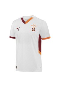 Maillot de football blanc avec des accents rouges et oranges. Présente un col en V, un logo de club et une texture en motif ondulé sur tout le tissu.