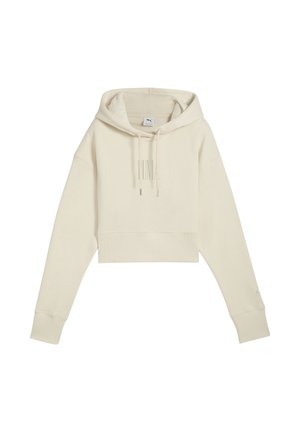 Beskåret beige hoodie med snoretræk, ribbestrikket tekstur og subtil "PUMA" logo på brystet. Har brede ærmer og lige søm.
