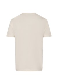 Camiseta de manga corta hecha de algodón beige claro. Presenta un cuello redondo simple y hombros sin costuras, con una textura suave y lisa.