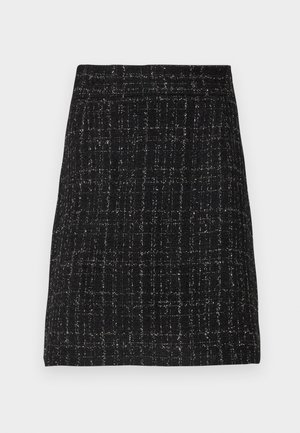 Schwarzer Tweed-Minikilt mit strukturiertem Muster und silbernen Akzenten. Gerader Schnitt, ungefüttert und mit einem flachen Taillenbund für einen maßgeschneiderten Look.