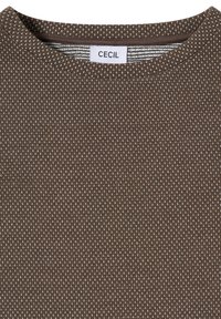 Brown textured fabric featuring a grid pattern with small white dots. Round neckline with a label reading "CECIL" inside.