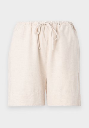 Pantaloni corti color beige chiaro realizzati in tessuto testurizzato, dotati di una vita elastica con coulisse e tasche laterali.