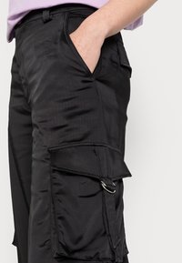 Weekday GARDA TROUSER - Calças cargo - black