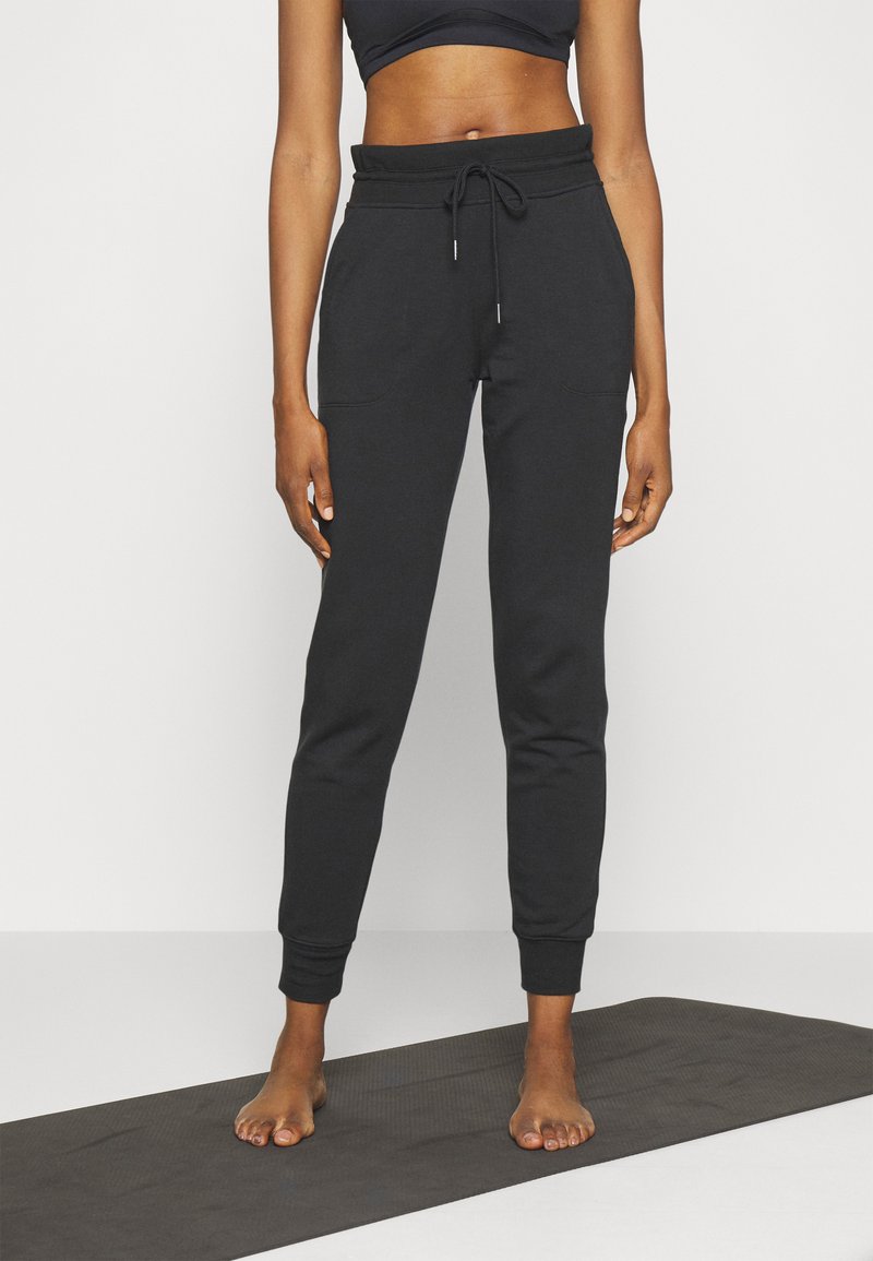 Athleta BALANCE JOGGER - Tracksuit bottoms - black - Zalando.ie