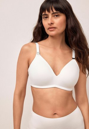 Weißer Triangel-Bralette mit verstellbaren Trägern und silbernen Beschlägen. Glatte Stoffoberfläche, V-Ausschnitt und minimale Nähte für hohen Tragekomfort.