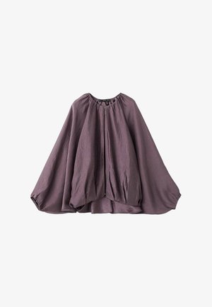 Top stile mantella viola con maniche voluminose, orlo arricciato e cerniera frontale. Realizzato in tessuto leggero e strutturato.