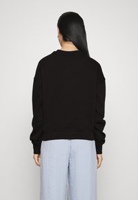 CHIARA FERRAGNI Sudadera - black