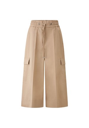 Beige cargo kalhoty širokého střihu s elastickým páskem, stahováním na šňůrku a dvěma bočními kapsami; hladká látka s volným střihem.