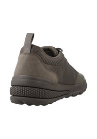 Dark brown sneaker with a mesh and suede upper, textured rubber sole, and pull tab at the heel for easy wear.