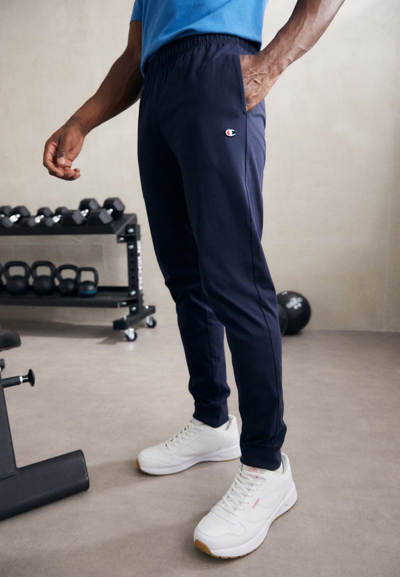 Champion - ICON ELASTIC CUFF PANTS - Treniņtērpa apakšdaļas - navy, Palielināt