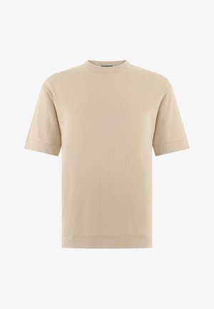 Béžový krátký svetr s kulatým výstřihem, krátkými rukávy, s přímým lemem a volným střihem.