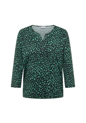 Zwart long sleeve top met een groen onregelmatig stippenpatroon, V-hals en een losse pasvorm.