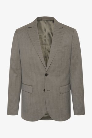 Hallhalline halliseks rõngastikuga bleiser, mis on valmistatud tekstureeritud kangast. Omab lõikega kraed, kahte eesmist taskut ja kahte nööpi. Sisepind on vooderdatud kontrastse värviga.