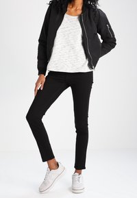 Levi's® Jeans Skinny Fit - black denim