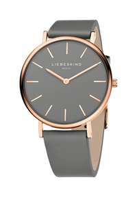 Grau Silikonarmbanduhr mit grauem Ziffernblatt, roségoldenen Zeigern und minimalistischen Stundenmarkierungen. Markenname "LIEBESKIND BERLIN" angezeigt.