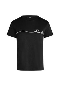 Černé bavlněné tričko s kulatým výstřihem. Na hrudi má bílý vyšívaný podpis. Krátké rukávy, pohodlný střih.