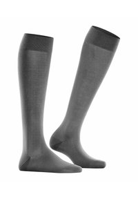 Knielange, dunkelgraue Socken aus einem glatten, dehnbaren Material. Mit einem gerippten Bund am oberen Ende. Einfaches, einfarbiges Design.