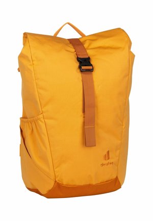 Yellow fabric backpack with a roll-top design, adjustable strap, side pocket, and a black buckle. Features subtle branding on the front.