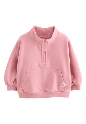 Lyserød fleecepullover med halvlange lynlåslukning ved kraven, lange puffede ærmer, frontlommer med kængurustil og ribstrikkede manchetter og kant.