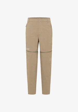 Beige wandelbroek voor dames die om te toveren is tot korte broek met afritsbare pijpen, een voorrits, zijzakken en een klein logo op het linkerdijbeen.