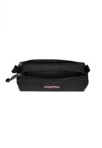 Black Eastpak pencil case with two zippered compartments, made of durable fabric. Features a logo patch and textured exterior for grip.