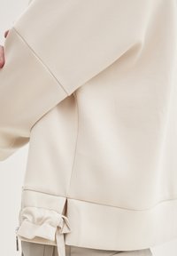 TOM TAILOR Majica s kapuljačom i patentnim zatvaračem - dusty beige