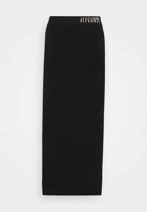 Černá pletená tužková sukně s vysokým pasem. Na vrcholu se nachází značka a má hladkou, lesklou texturu.