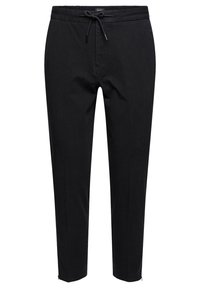 Czarne zwężane spodnie wykonane z miękkiej tkaniny, z elastycznym pasem ze sznurkiem do regulacji i zamkami błyskawicznymi przy kostkach.