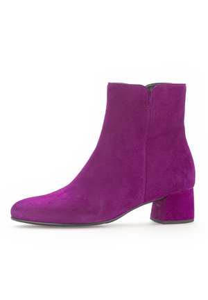 Purple suede ankle boot with a block heel, featuring a smooth texture and a simple design. Side zipper closure for easy wear.