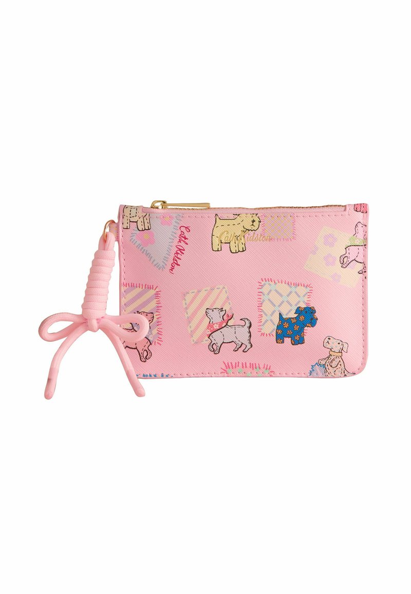 Rozā auduma maks ar suņu ilustrācijām, ģeometriskām shēmām un dekoratīvu rozā loku uz rāvējslēdzēja. Izmēri ir kompakti un taisnstūrveida.