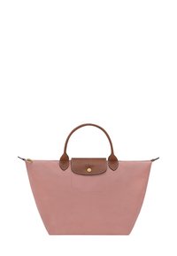 Unselected, rosa tee