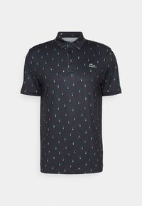 Black short-sleeve polo shirt with small green golfer patterns and a green crocodile logo on the left chest.