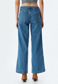Koton WIDE LEG - Flared jeans - blue denim