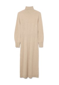 Vestido de punto beige con cuello alto, mangas largas y aberturas laterales. Fabricado en un tejido suave y texturizado para brindar comodidad y calidez.