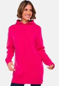 Sweat à capuche fuchsia avec poche kangourou, cordon de serrage et bord côtelé. Manches longues et coupe décontractée avec une texture douce.