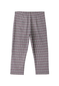 Pantalon droit avec un motif à carreaux noir, blanc et rouge sur fond blanc.