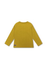 Langsleeve shirt in mosterdgele katoen, met een ronde hals, raglanmouwen en een klein paarse logo patch aan de onderste linkerkant.