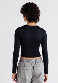 Hollister Co. SEAMLESS CREW  - Majica z dolgimi rokavi - casual black