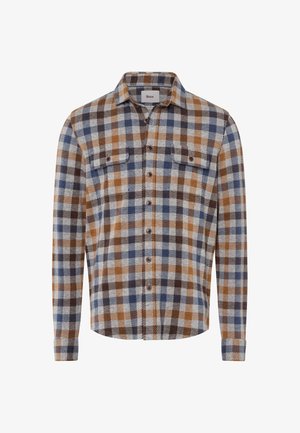 Camicia flanella a scacchi in marrone, blu e crema. Maniche lunghe, chiusura a bottoni, due tasche sul petto e un orlo leggermente curvato.