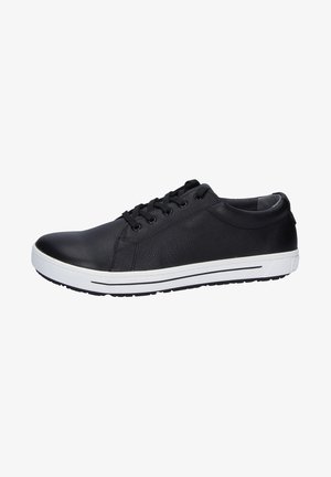 Black leather sneaker with a textured surface, round toe, seven eyelets, black laces, and white rubber sole featuring a tread pattern.