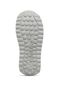Sole di scarpa in gomma bianca con motivi di grip circolari, bordi rigati e il nome del marchio "Naturino" impresso vicino al tallone.