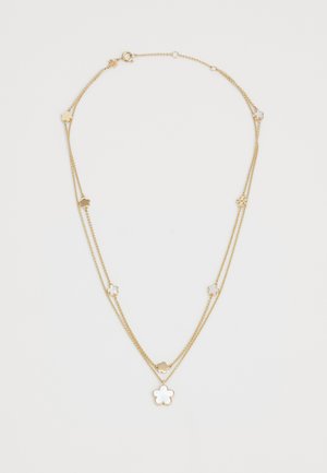 Gold layered necklace featuring floral charm accents, smooth texture, and a lobster clasp closure. Two chain lengths for adjustable styling.