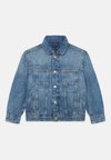 TRUCKER JACKET FLAG UNISEX - Jeansjakke